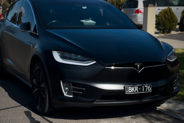 Tesla protected with ceramic coating in Truganina, featuring a glossy finish and shielding against UV rays, stone chips, and environmental damage